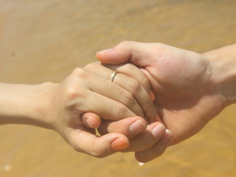 Couple holding hands