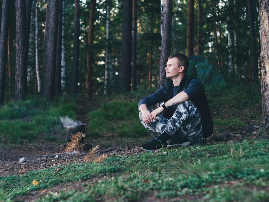 Man resting in a forest
